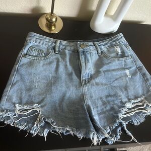 Two ripped jean shorts size 4/6